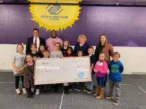 Newcleus CU Advisors, Managing Partner, John Moreno presents a $500 NewcleusGives Donation to BGCN in honor of Clarity Credit Union